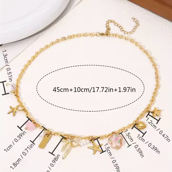 Stainless Steel Starfish Flower bow Charm Pendant Golden Color Necklace - Picture 2 of 3